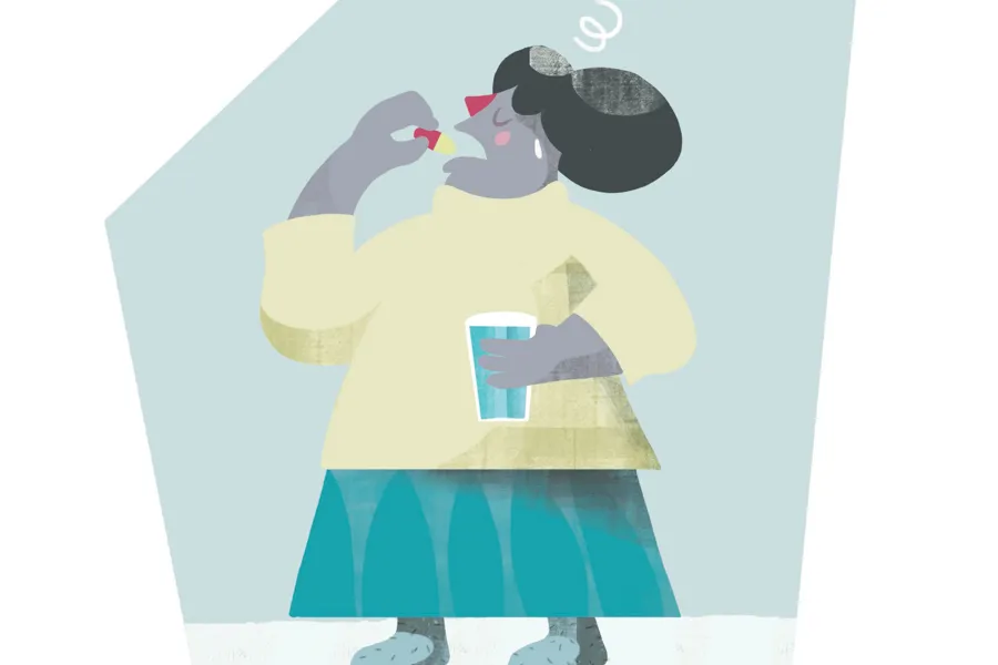 Illustrasjon av en dame som tar en pille